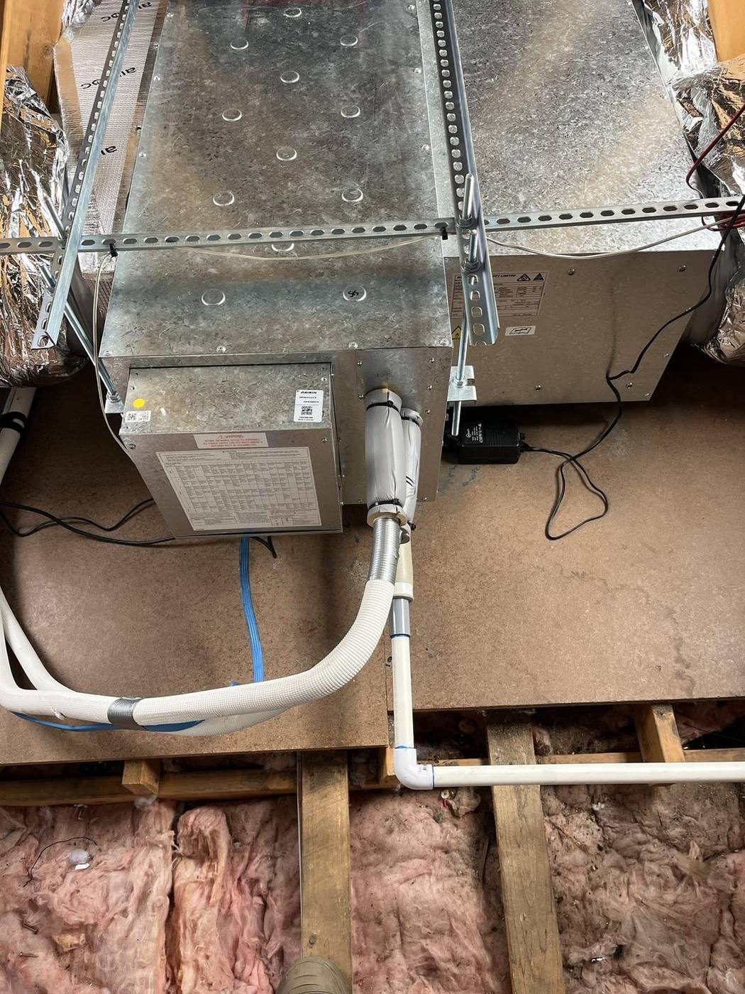 Ducted air conditioning indoor unit installed in the roof space by A-Temp Installations