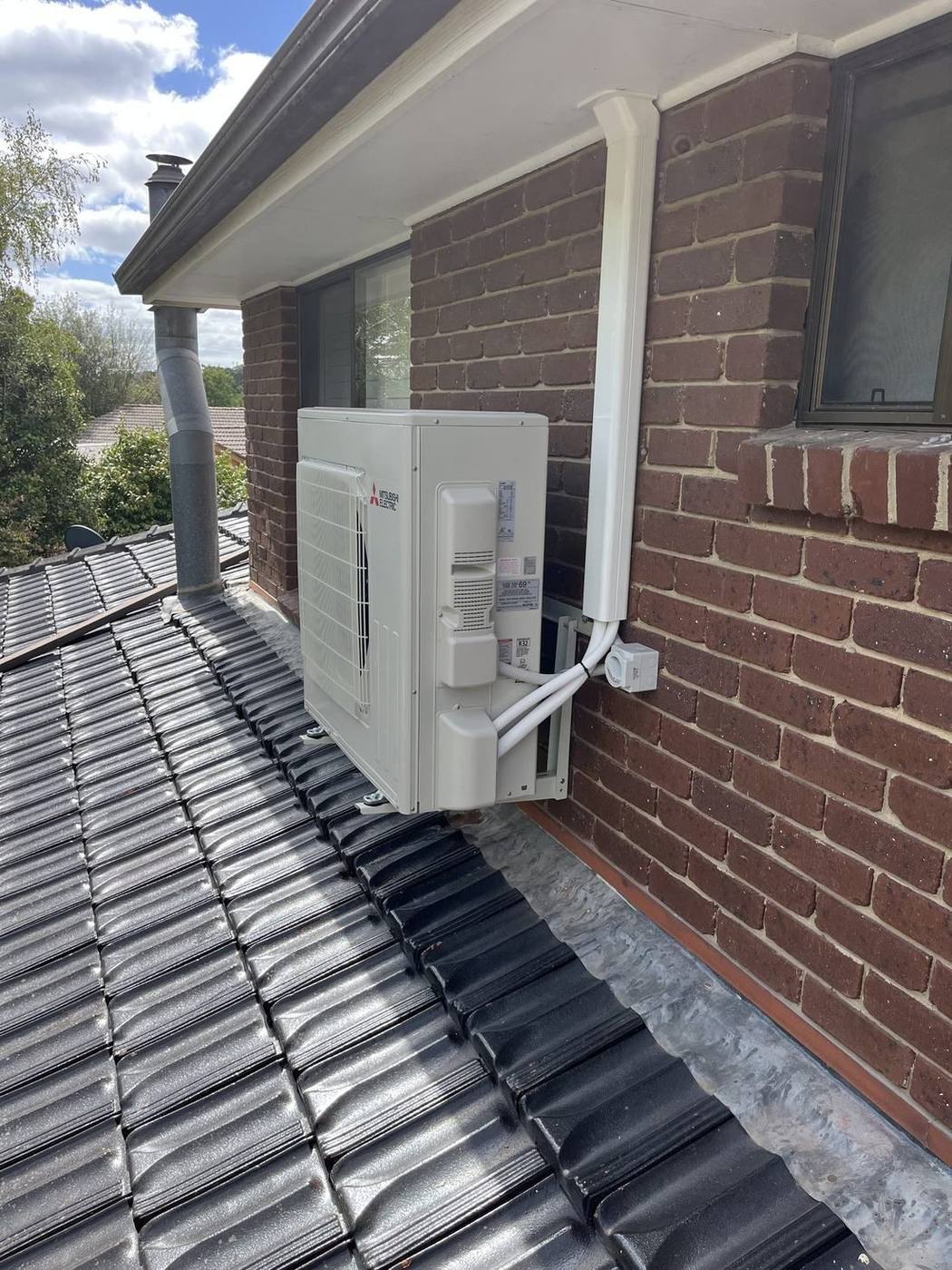 Mitsubishi Electric outdoor units installed on a Melbourne roof by A-Temp